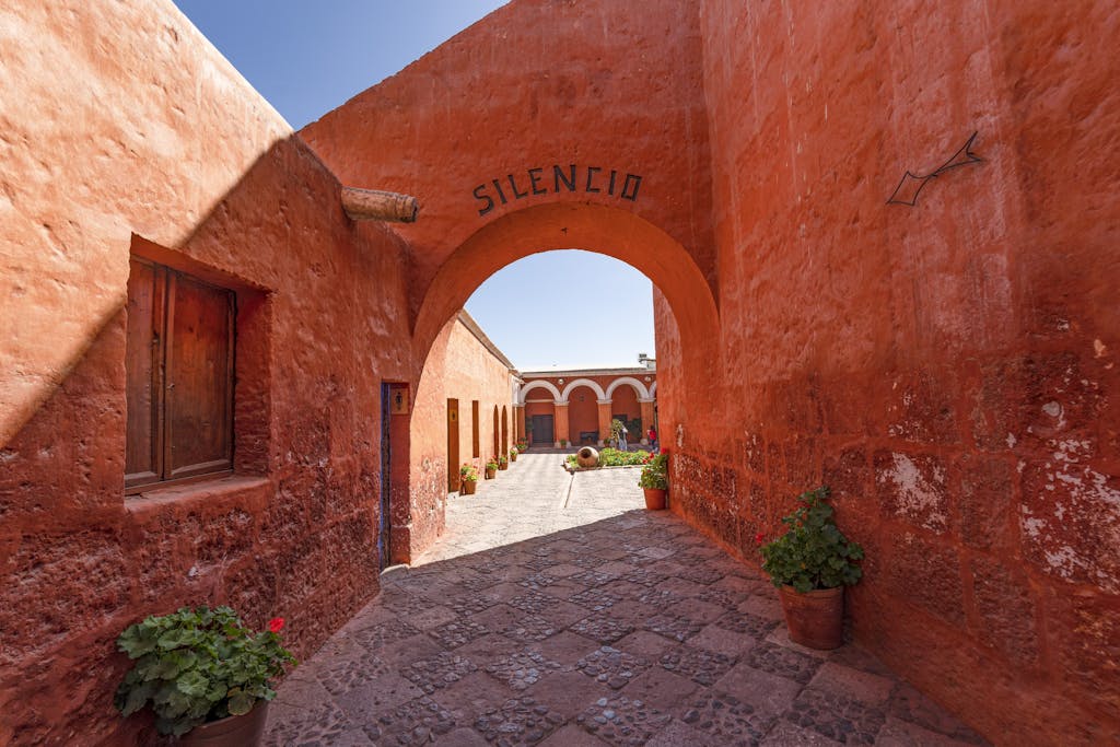 Explore the tranquil archways of Santa Catalina Monastery in Arequipa, Peru.